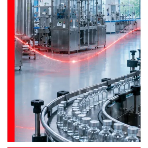 Modern pharmaceutical manufacturing facility with stainless steel equipment, automated vial conveyor, and red digital data wave overlay symbolising FDA regulatory oversight and digital quality systems.