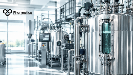Pharmatica image of a stainless-steel bioreactor and connected equipment in a bright biopharmaceutical manufacturing facility, illustrating continuous biologics production.