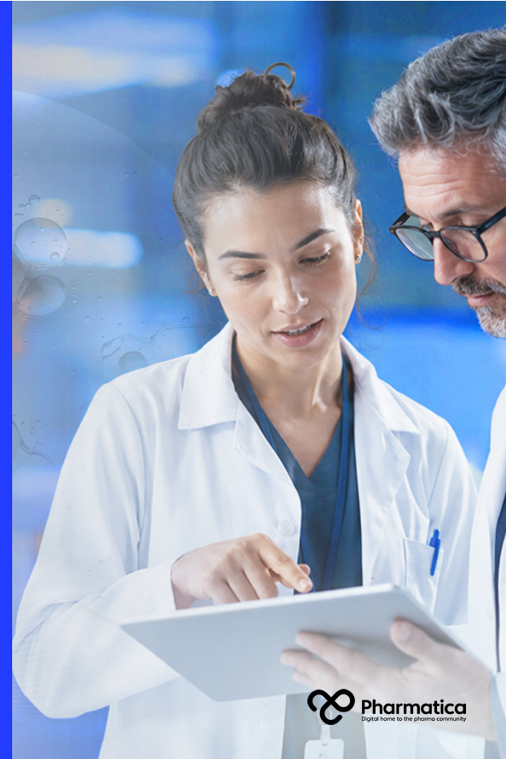 Pharmatica image showing two clinical researchers in white laboratory coats reviewing trial data on a digital tablet in a modern pharmaceutical research environment. The background shows laboratory equipment and translucent scientific graphics, symbolising adaptive clinical trial design, evidence‑driven decision‑making, and digital data integration in clinical development.