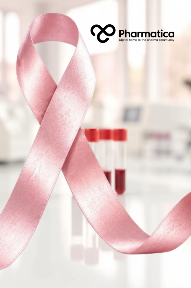 Pharmatica image of a gloved hand holding a blood sample tube in a bright laboratory with red and pink tones and the Pink Breast Cancer Awareness ribbon.